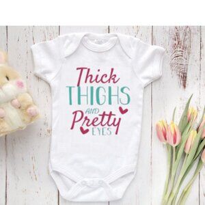 Thick Thighs and Pretty Eyes Onesie